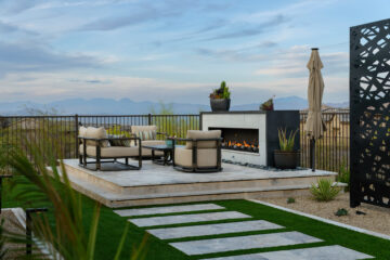 Raised deck with chairs, trellis, and firepit