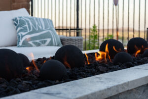close up of canon balls in firepit