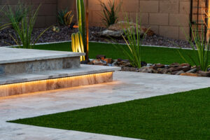 angled steps with lights underneath and desert landscape 